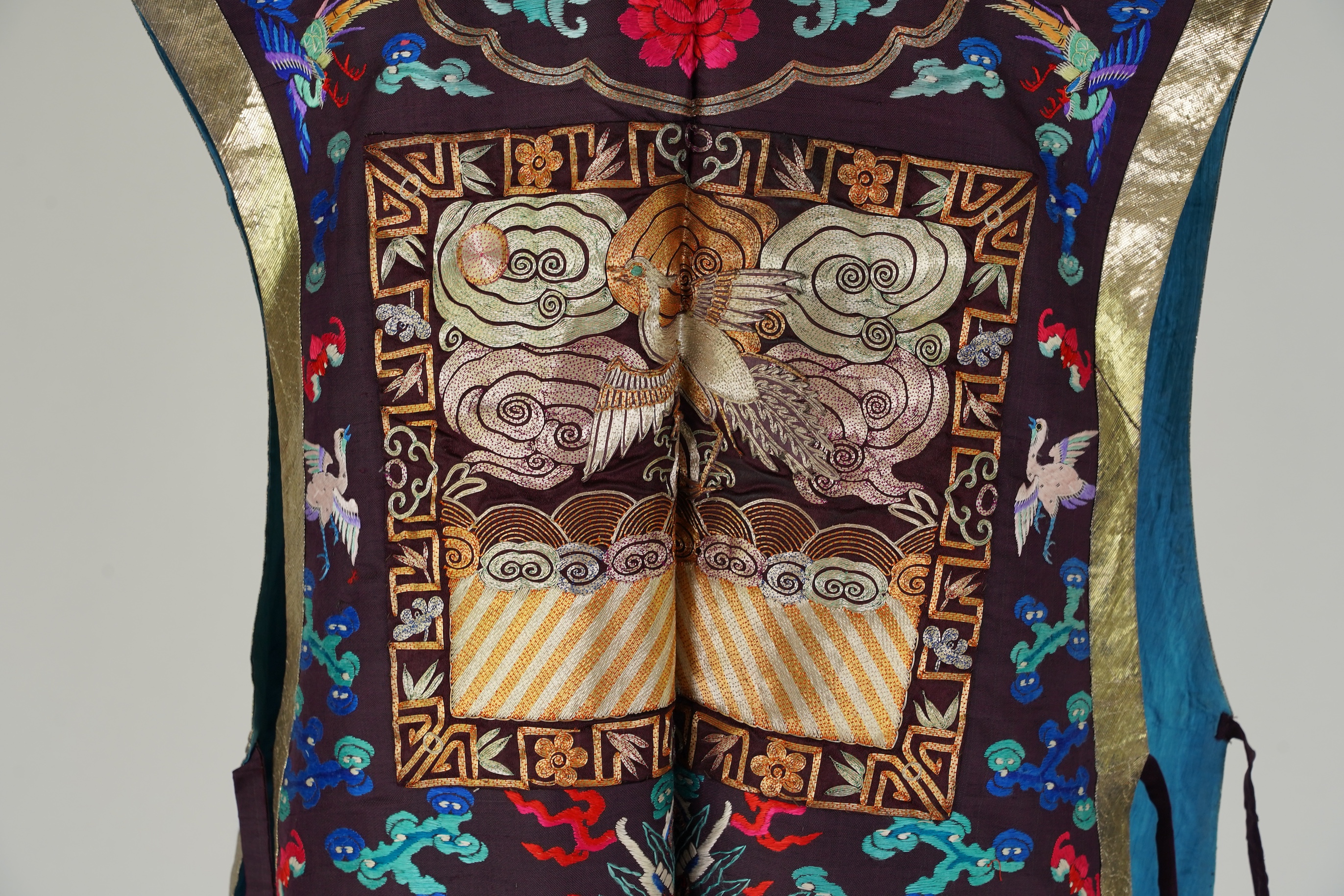 A Chinese embroidered silk vest, xiapei, early 20th century